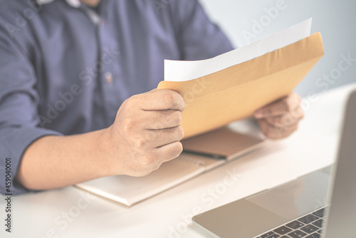 businessman ready for presentation her job with laptop and holding her black note, work from home, partnership, home office, project, quarantine, meeting, presentation, business and finance concept