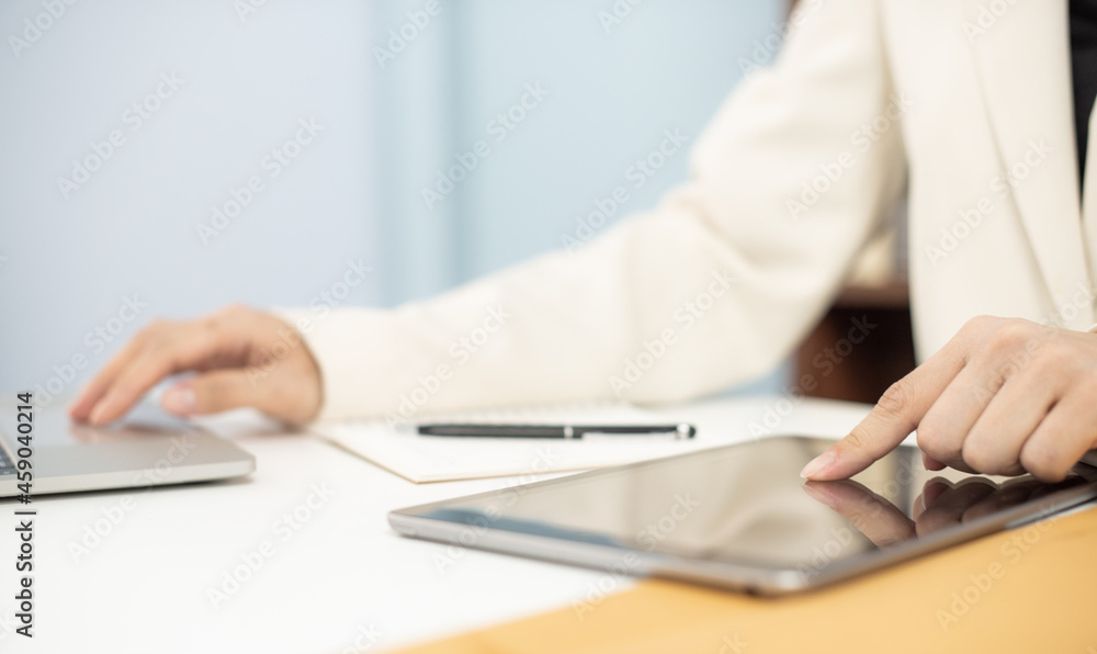 Business woman in suite working with documentary data on white desk at office, Business accounting and financial concept Business woman in suite working with documentary data on white desk at office, Business accounting and financial concept