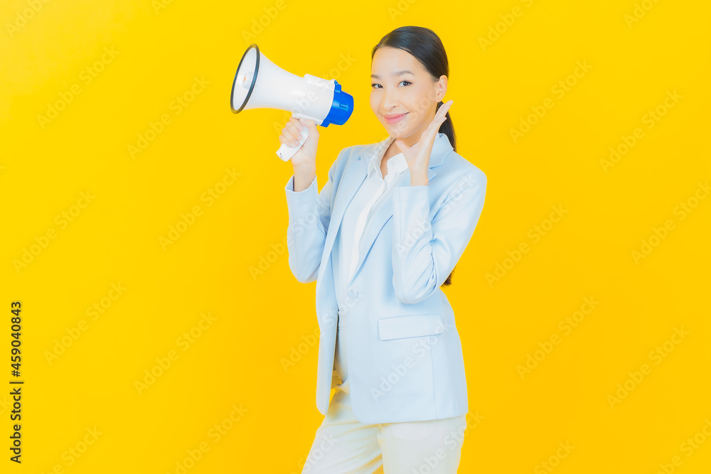 Portrait beautiful young asian woman smile with megaphone Portrait beautiful young asian woman smile with megaphone