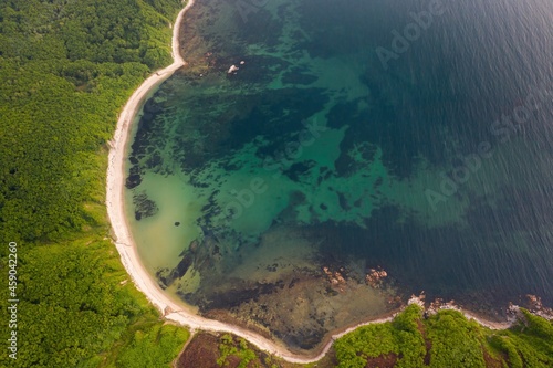 View from a drone to the sandy coast of bay photo