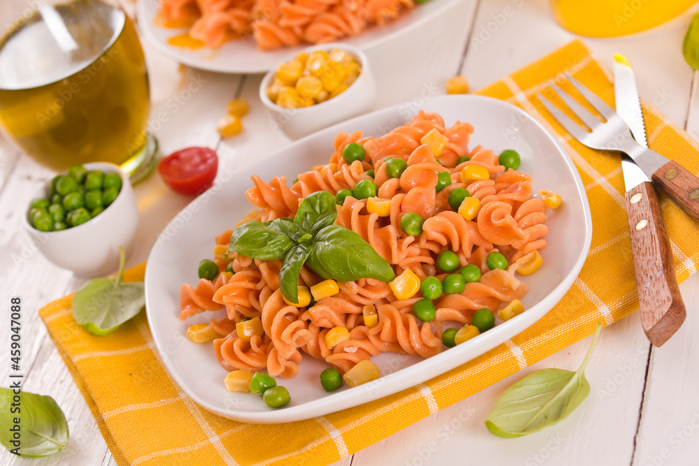 Fusilli pasta with peas and sweet corn. Fusilli pasta with peas and sweet corn.