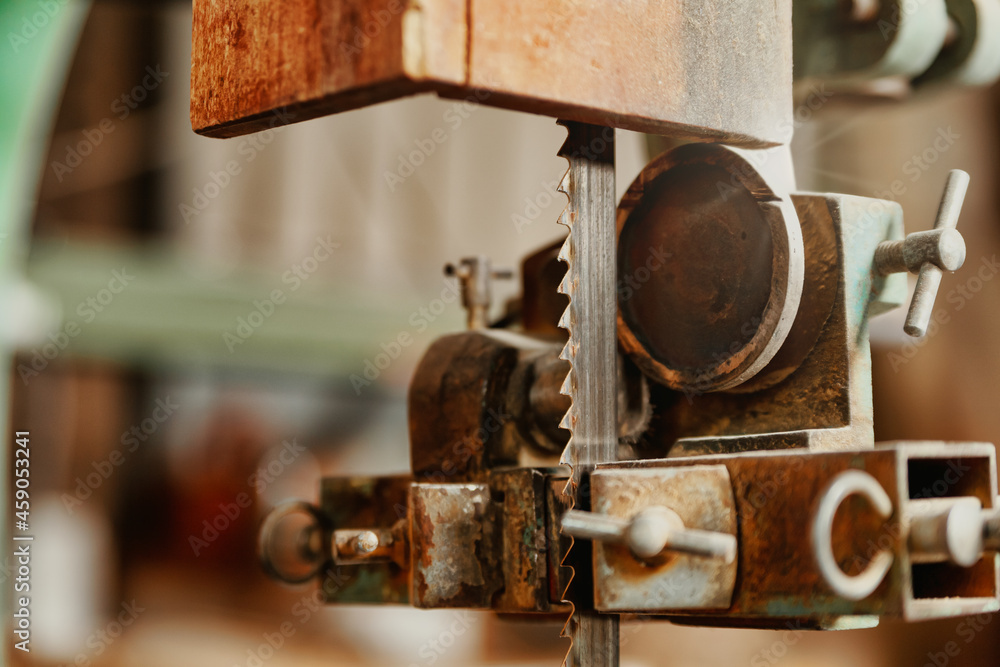 Fototapeta premium Focus to the sharp steel teeth on a band saw blade