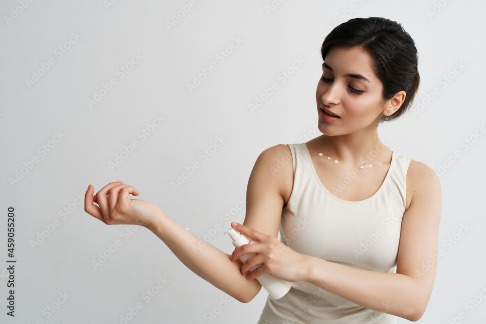 woman applying cream on hand clean skin health moisturizing