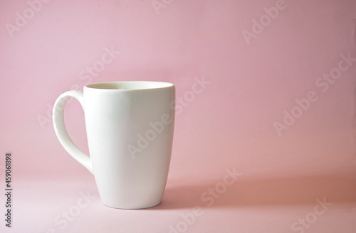 white cup mockup with pink background and shadow 