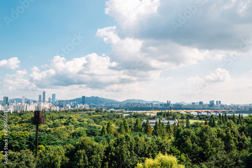 Fototapeta Naklejka Na Ścianę i Meble -  Panoramic view of Seoul city and green forest from Sky park in Korea