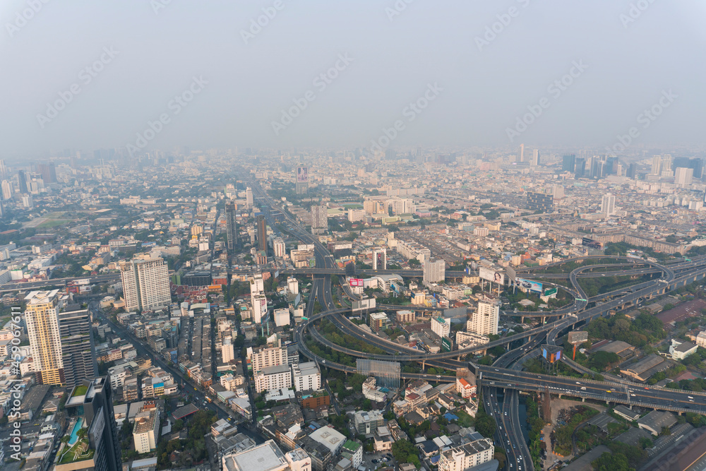 Landscape of the top view Bangkok metropolis Thailand with the dirty clouds air pollution problem and issue. the tower and building in business area