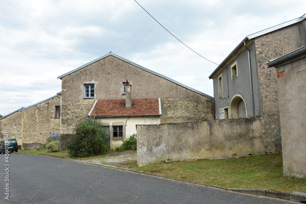Facade of a farmhouse in the old village Voisey in the French Champagne Ardennes