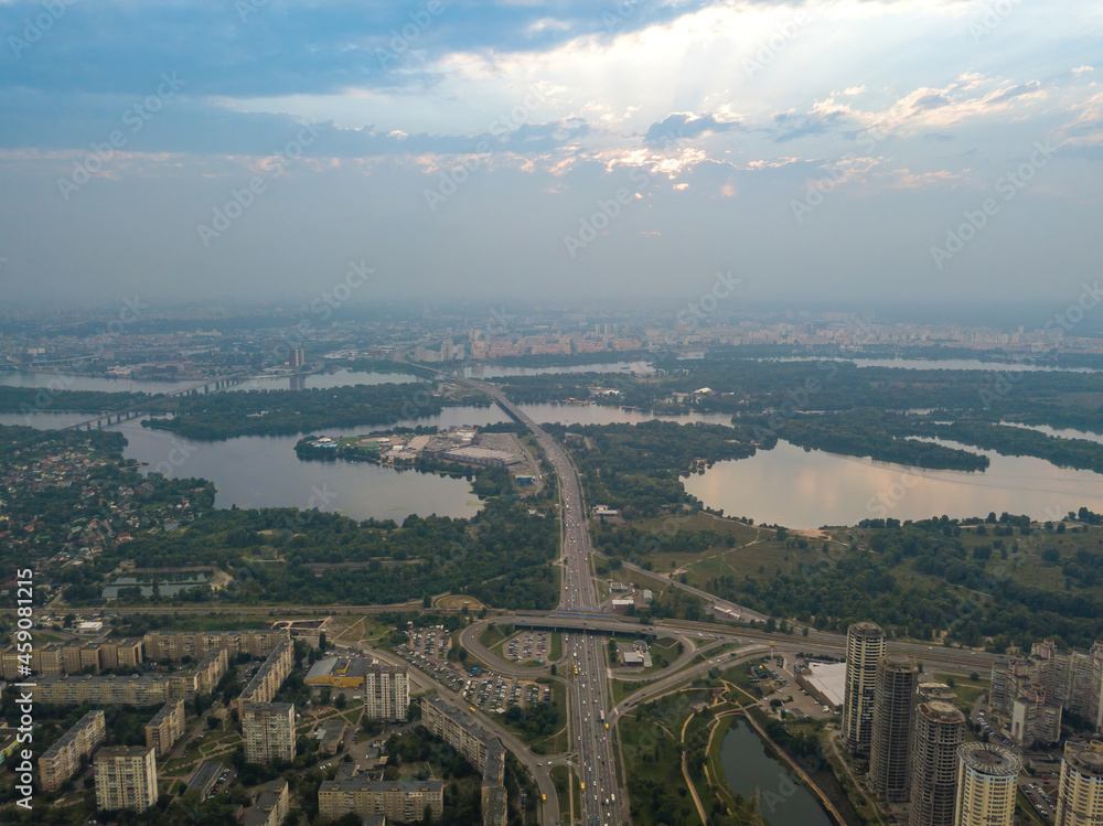 Obraz premium Sunset over Kiev. Cloudy evening. Aerial drone view.