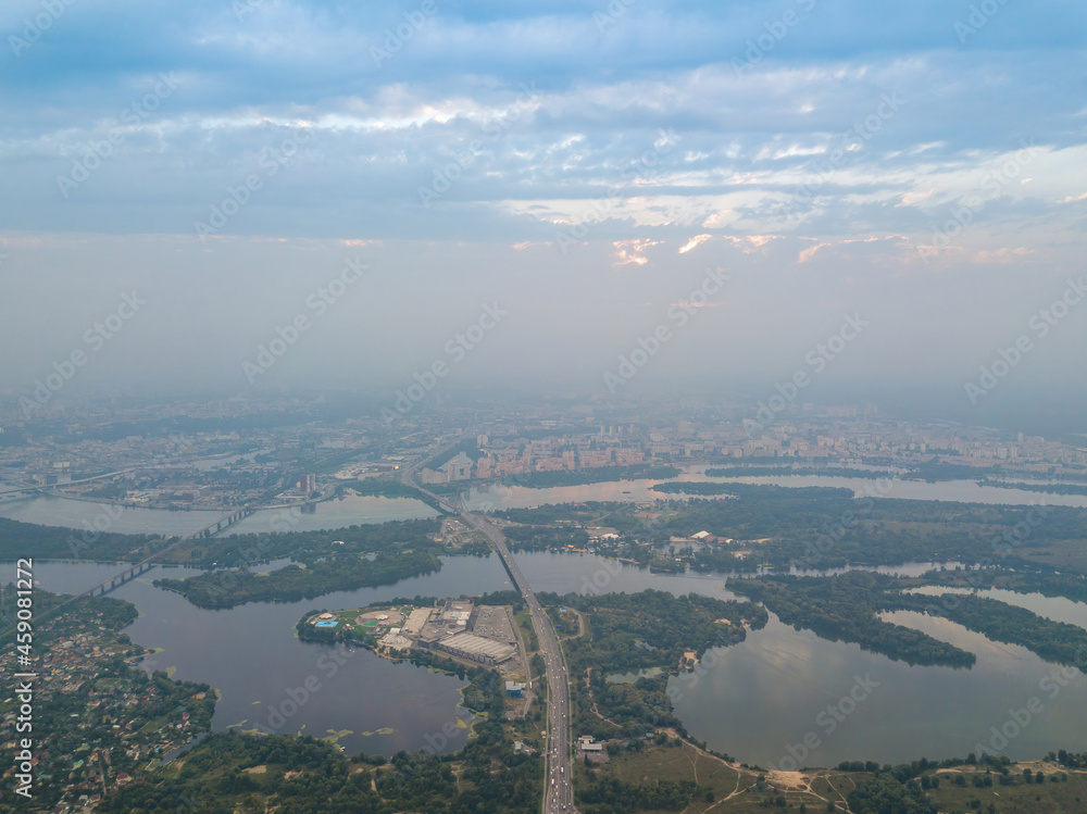 Sunset over Kiev. Cloudy evening. Aerial drone view.