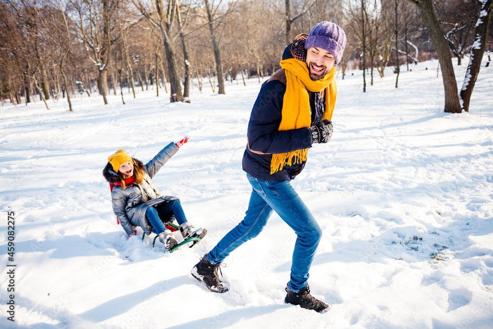 Full size photo of happy funky funny smiling family father and daughter having fun outside winter vacation holiday Full size photo of happy funky funny smiling family father and daughter having fun outside winter vacation holiday