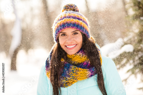 Photo of young attractive woman happy positive smile cheerful good mood pretty fly air snow winter park