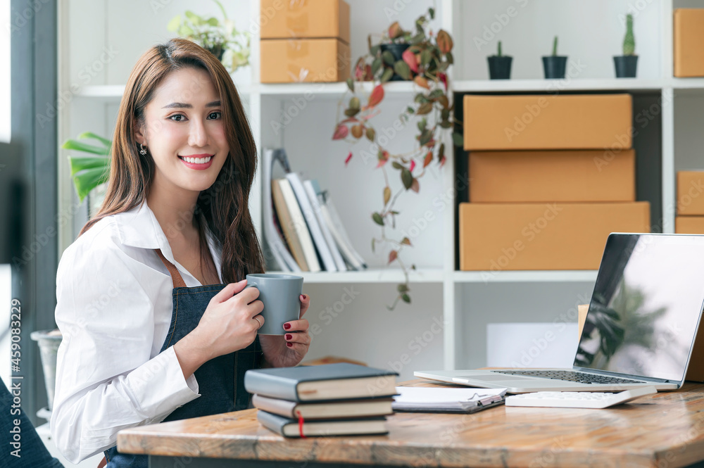 Asian Small business entrepreneur SME working at home. Asian Small business entrepreneur SME working at home.