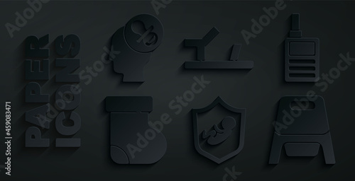 Set Baby on shield, Monitor Walkie Talkie, socks clothes, potty, shoes and dummy pacifier icon. Vector