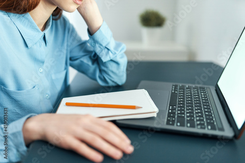 woman in front of laptop work fatigue lifestyle manager