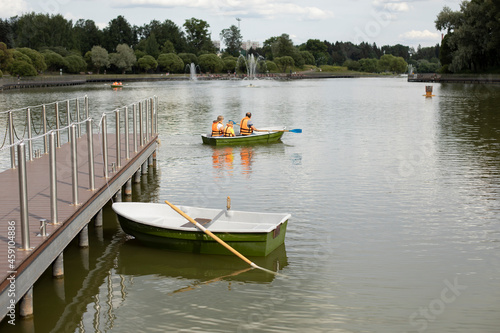 Boat at the pier. Marina with water transport.