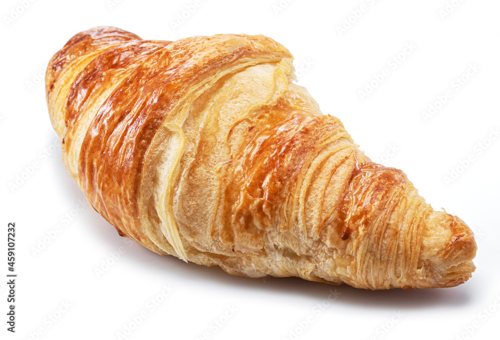 Tasty crusty croissant close-up on a white background.
