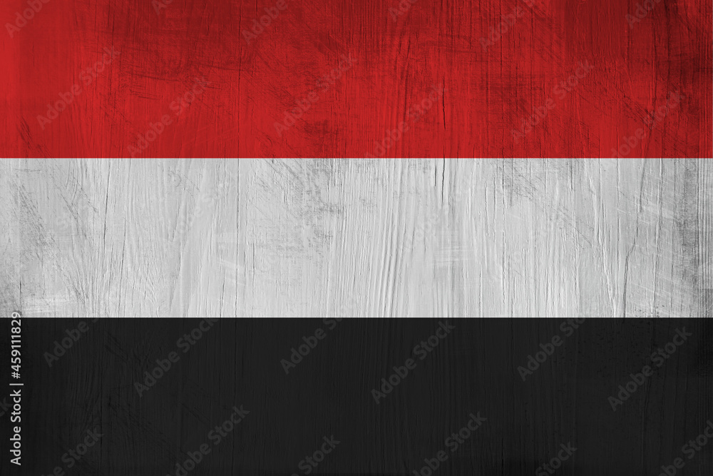 Patriotic wooden background in color of Yemen flag
