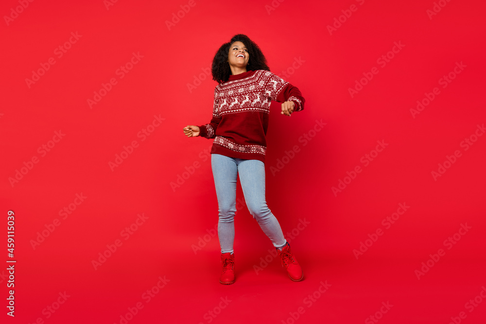 Obraz premium Full length body size photo woman smiling chilling laughing dancing at party isolated vivid red color background