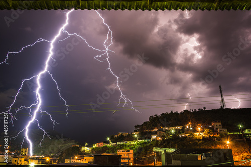 Huge lightning bolt that hit the ground approximately 700m from where I was. Summer 2015 in Epsera Feliz, east of Minas Gerais, Brazil. photo