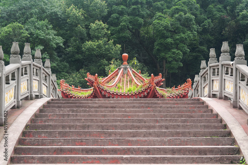 arched steps towards a chinese gazebo