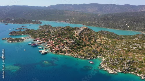 Kekova, also named Caravola, is a small Turkish island near Demre district of Antalya province which faces the villages of Kaleköy and Üçağız. Kekova has an area of 4.5 km² and is uninhabited. photo