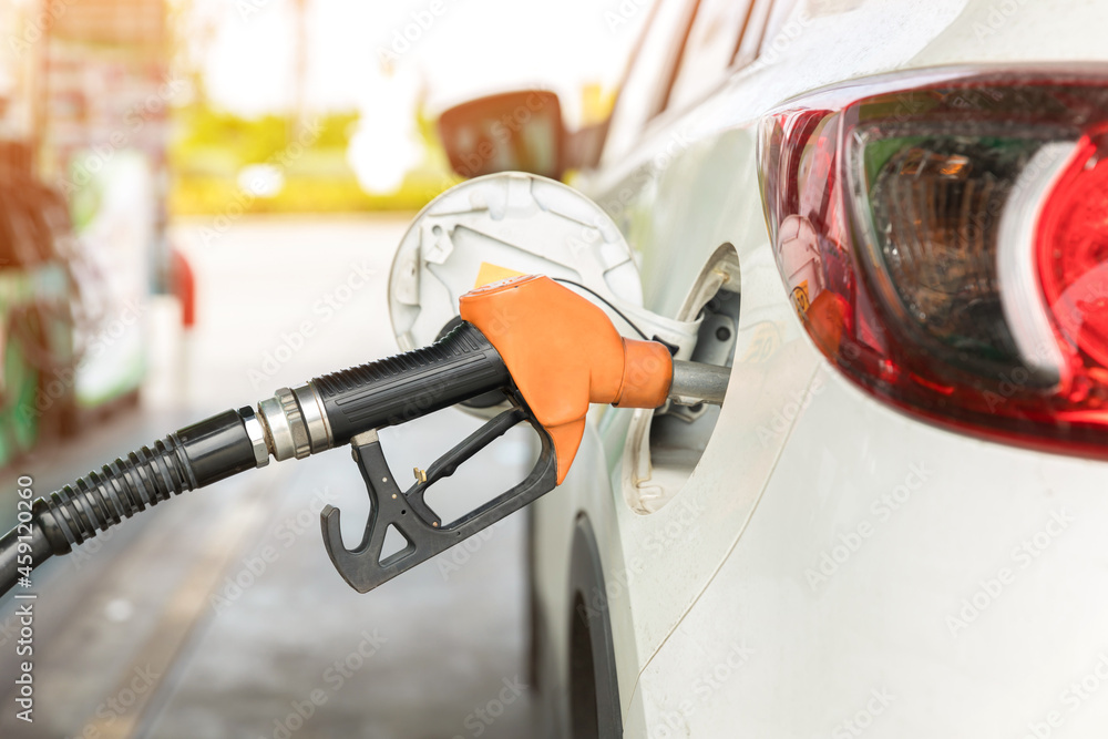 Refill and filling Oil Gas Fuel at station. Gas station refueling. To