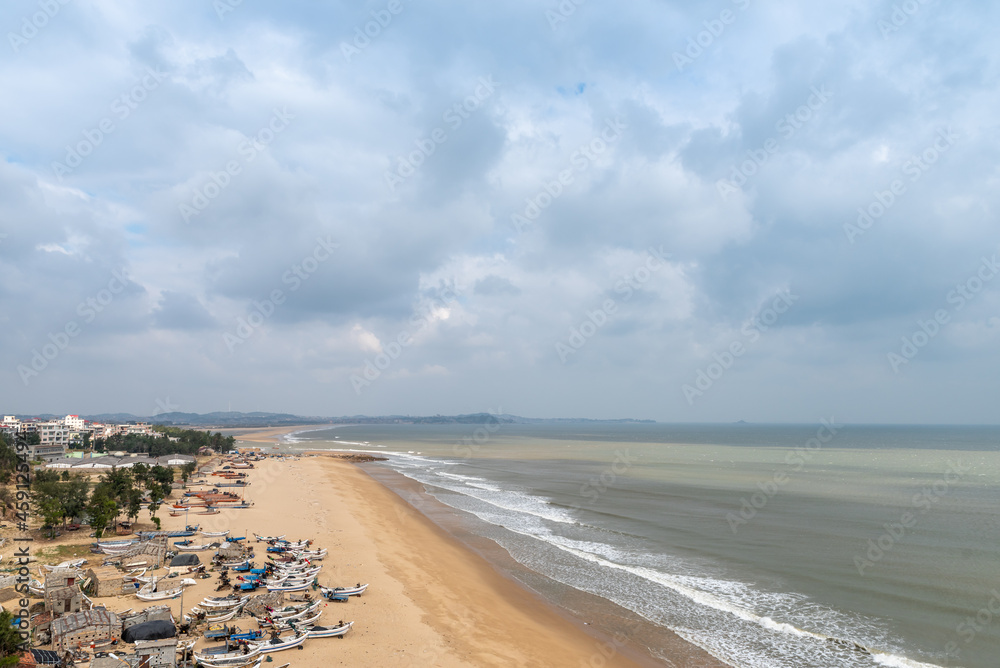 Sunny sea and beach, white waves, golden beach Sunny sea and beach, white waves, golden beach