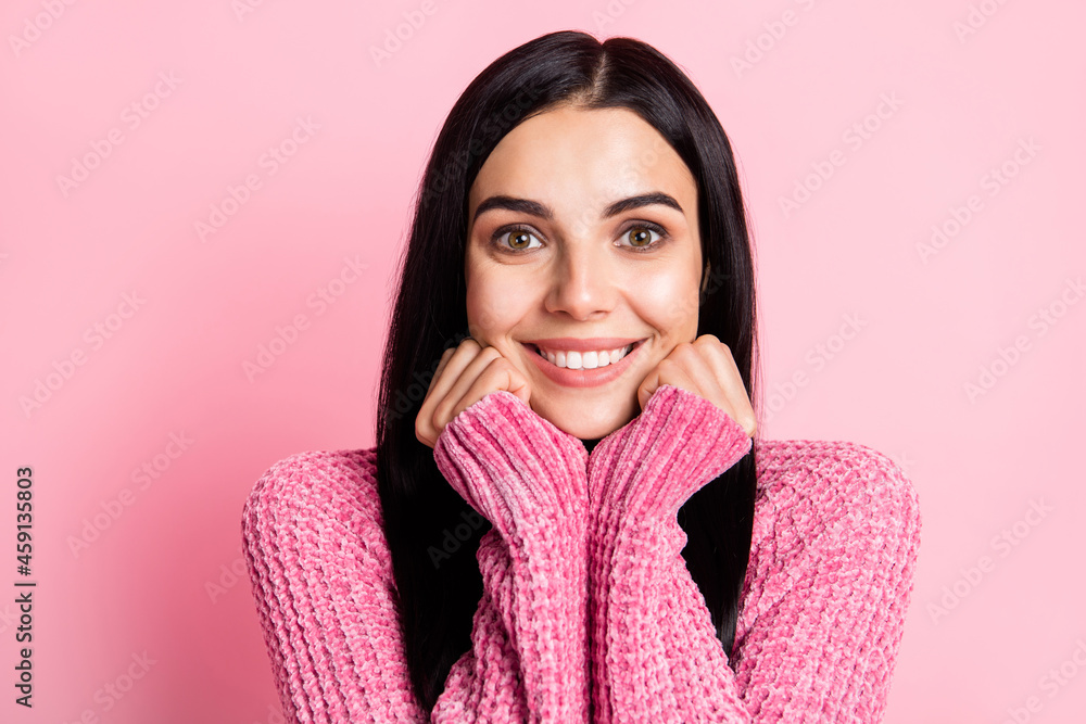 Photo of pretty satisfied young girl arms under chin toothy smile look camera isolated on pink color background Photo of pretty satisfied young girl arms under chin toothy smile look camera isolated on pink color background