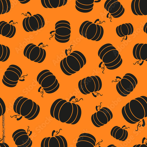 Simple black pumpkin seamless repeat pattern. Irregular, vector cultivar of winter squash plants randomly placed all over print on orange background.