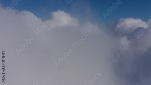 Flying in the clouds is high in the mountains of Turkey photo