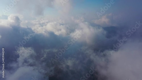 Flying in the clouds is high in the mountains of Turkey photo