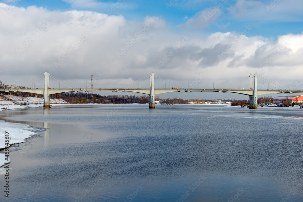 View of the road bridge across the Volga in the city of Kimry on a winter day. The longest bridge in the Tver region
