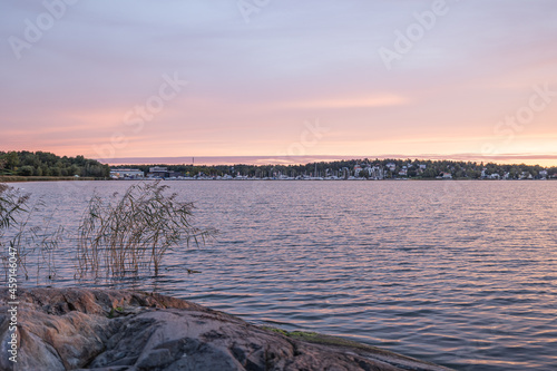 view over water in sunrise on Baltic Sea bay photo