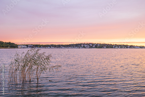 view over water in sunrise on Baltic Sea bay photo