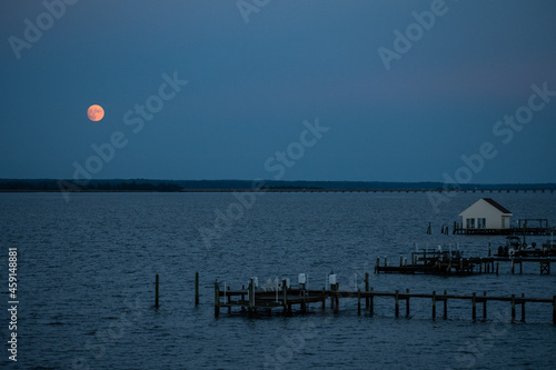 Harvest Moon Rises over the Northern Neck above the Rappahannock River in Tappahannock, Virginia part of the Middle Peninsula photo