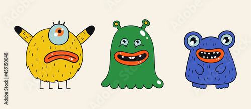 A set of three cartoon stickers with monsters. Various creepy and scary freaks on a beige background. Multi-colored characters for postcards, decor, covers, social networks. Hand drawn vector. photo