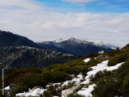 hiker on the top of the snowy mountain