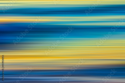 Futuristic abstract background in vibrant fluorescent blue and yellow colors, fine art, sunset seascape