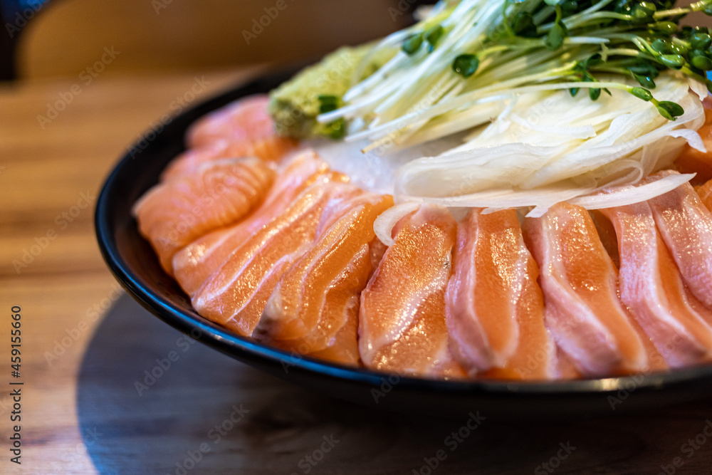Salmon sashimi on ice, Japanese food izakaya style Salmon sashimi on ice, Japanese food izakaya style