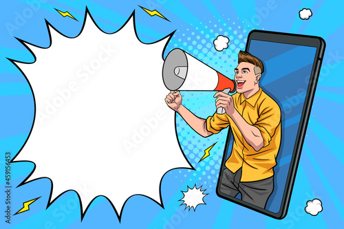 young man handsome shouting using megaphone out from smartphone
