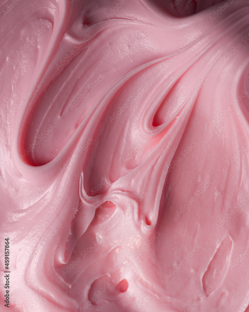 Pink icing frosting close up texture Pink icing frosting close up texture