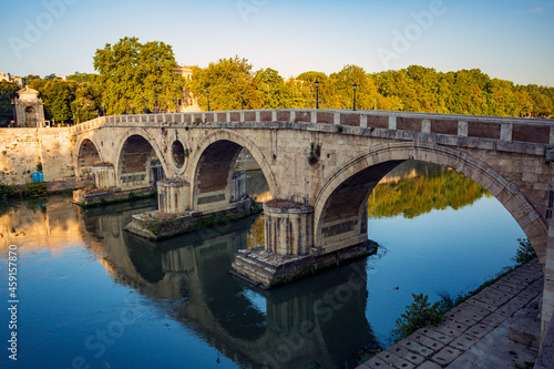 Along the banks of the Tiber River in Rome. Ancient bridges