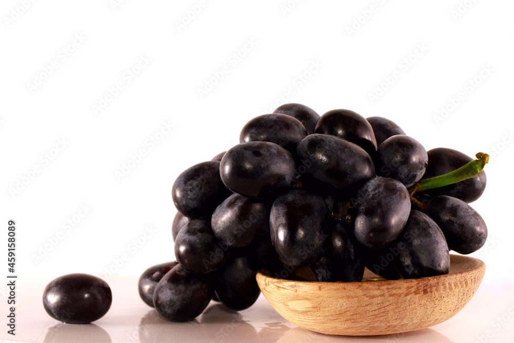 the isolated white background, Grapes Vítis vinífera cultural (Latin) - a type of long-term shrubby lianas from the sort Grapes of Family Grape. Fruits of grapes are used in fresh food, the isolated white background, Grapes Vítis vinífera cultural (Latin) - a type of long-term shrubby lianas from the sort Grapes of Family Grape. Fruits of grapes are used in fresh food,