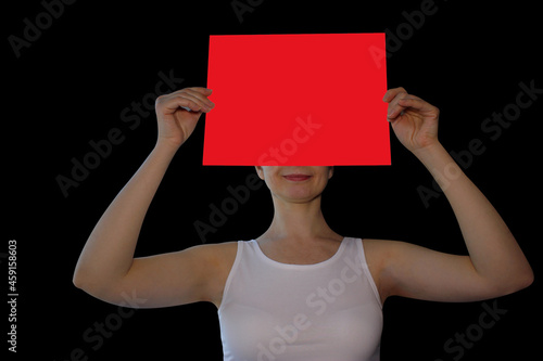 the person, the woman to hold the poster, color, the sheet of paper, the place for the text isolated against