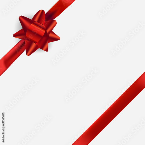 Red ribbon and bow on white box