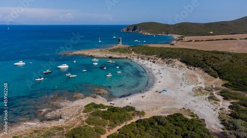 Aerial view of the Genoese tower Santa Maria di la Cappella on the Cap Corse in Upper Corsica, France - Remains of a medieval building half demolished and flooded by the Mediterranean Sea photo