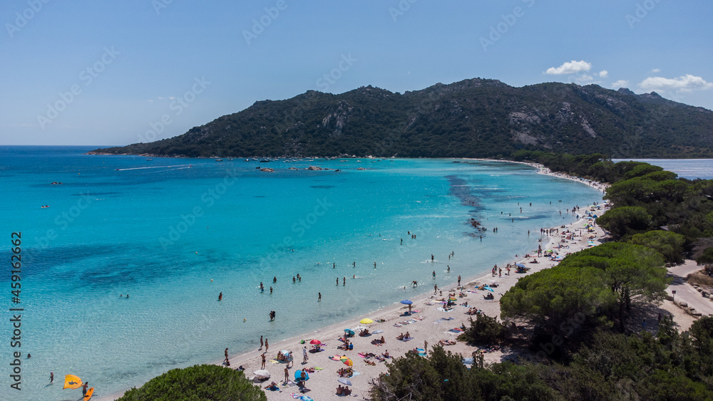 Aerial view of the beach of Santa Giulia in the South of Corsica, France - Bay with shallow turquoise waters near Porto Vecchio in the Mediterranean Sea
