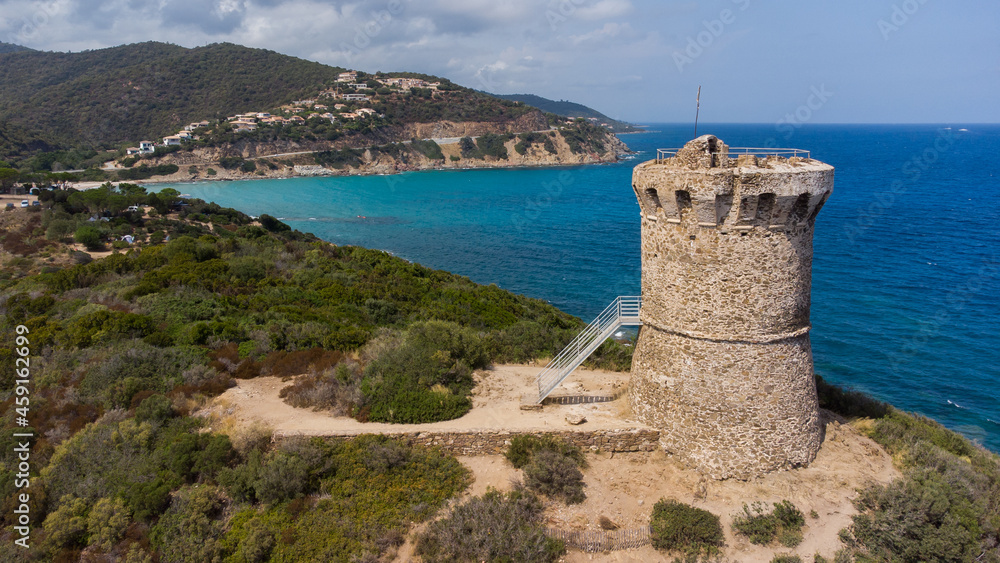 Aerial view of the ruins of the round Genoese tower of Fautéa in the South of Corsica, France - Remains of a medieval lookout overlooking the Mediterranean Sea