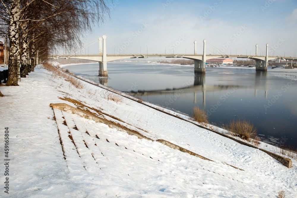 View of the road bridge across the Volga in the city of Kimry on a winter day. The longest bridge in the Tver region