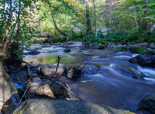 stream in the woods; Alnaelva in Oslo, Norway. Svartdalen , Bryn photo